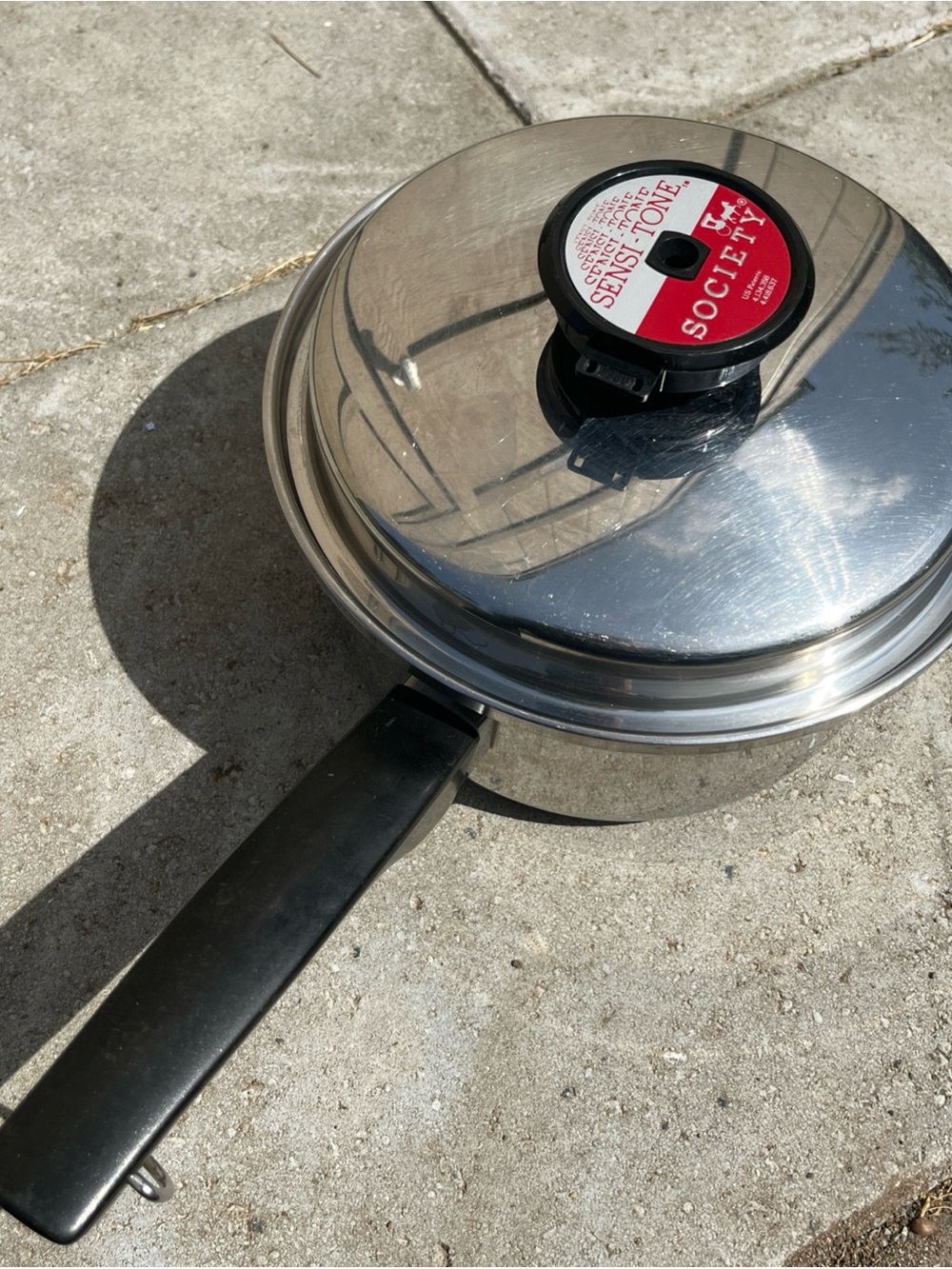 Society Stainless Steel pot with Black Handle and Red Lid Accent
